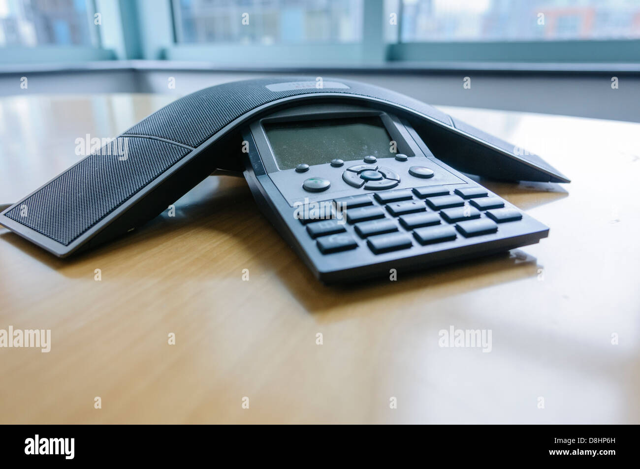 A Cisco Polycom IP "Spider" conference phone in a modern office Stock Photo