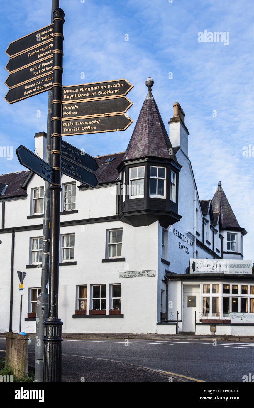 Tourist signs in Ullapool in the Highlands of Scotland. Stock Photo