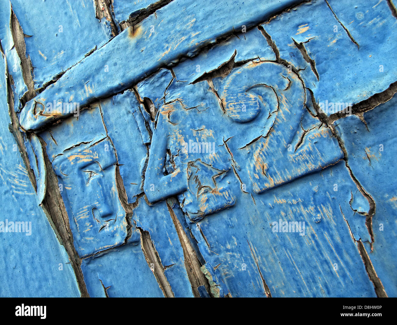Highly Textured number 42 On a Peeling Paint Door Stock Photo
