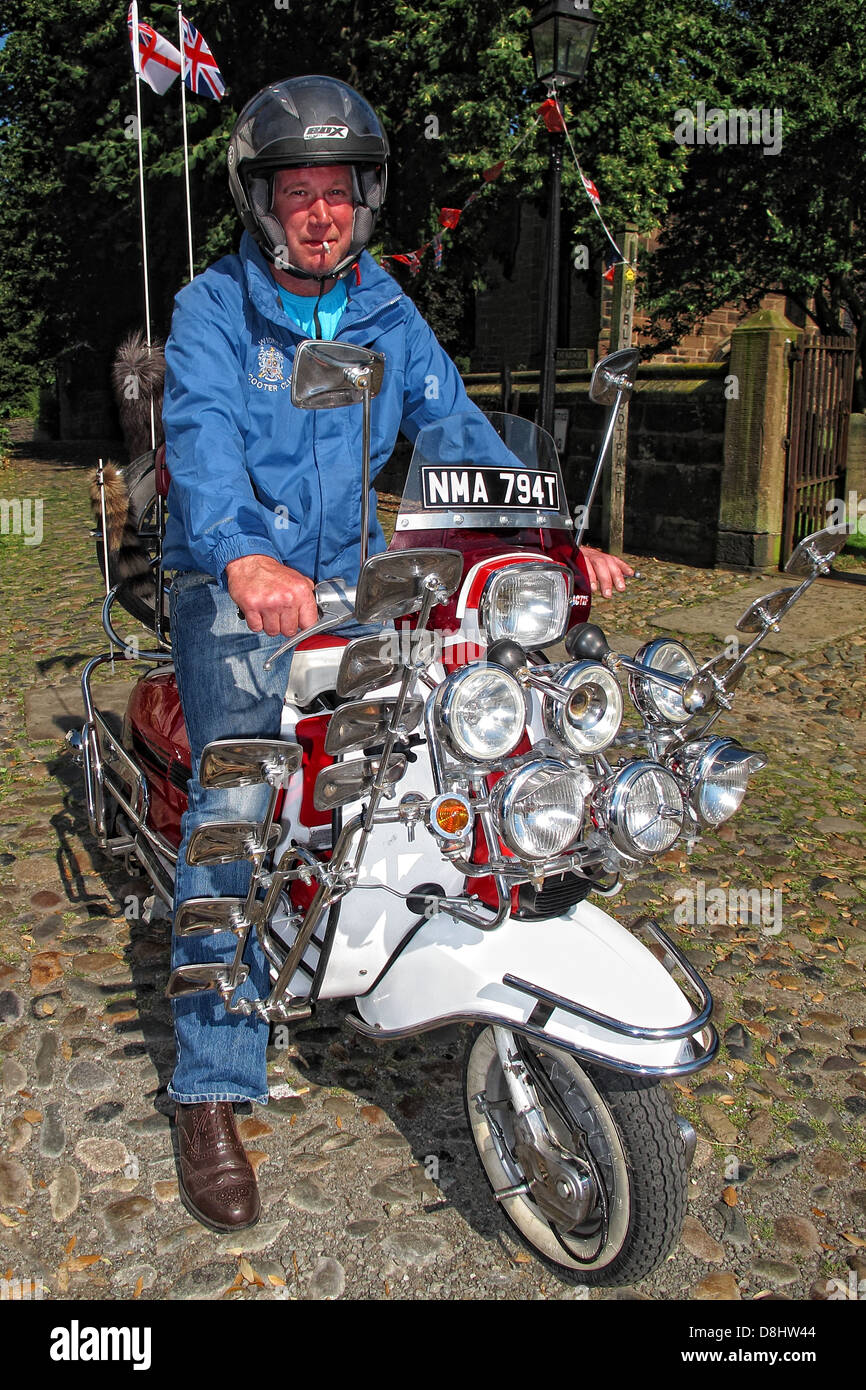 Scooter NMA 794T from Widnes Scooter Club, Halton, Cheshire, North West England, UK - Accessorized with mirrors and lights Stock Photo