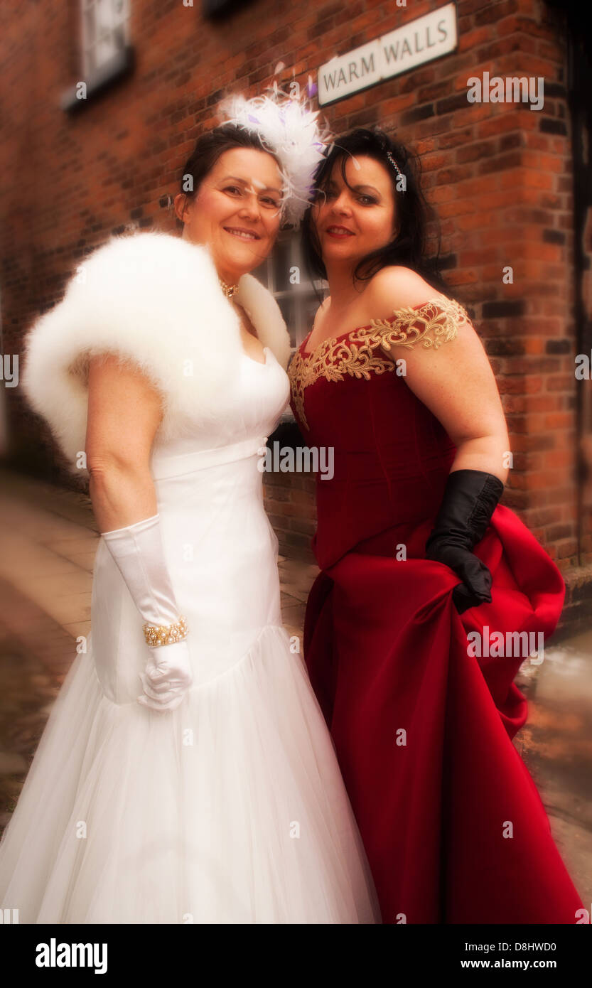 Two ladies, by Warm Walls an old bakehouse in Sandbach, south Cheshire England UK Europe Stock Photo
