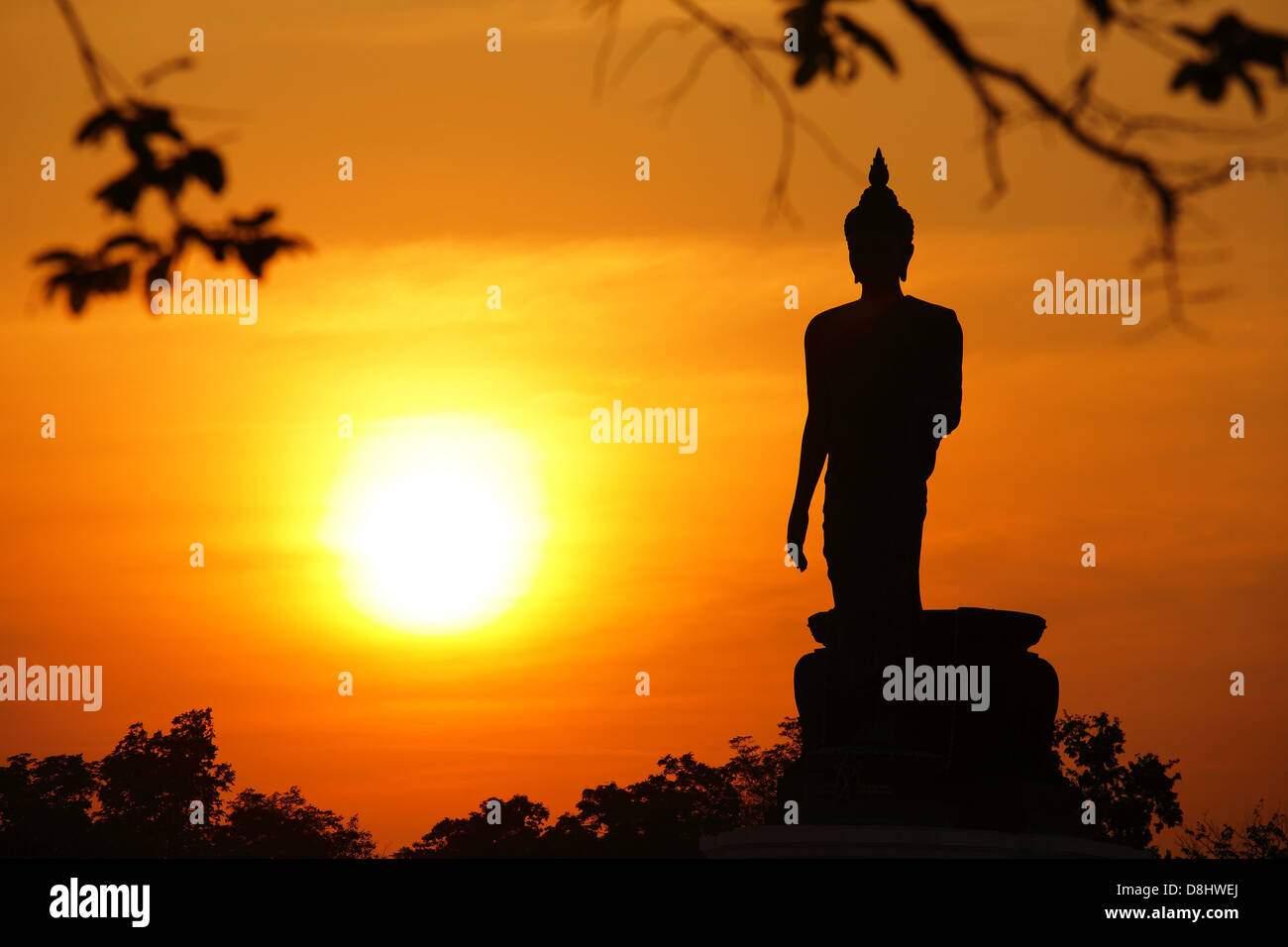 buddha statue of sunset in thailand Stock Photo