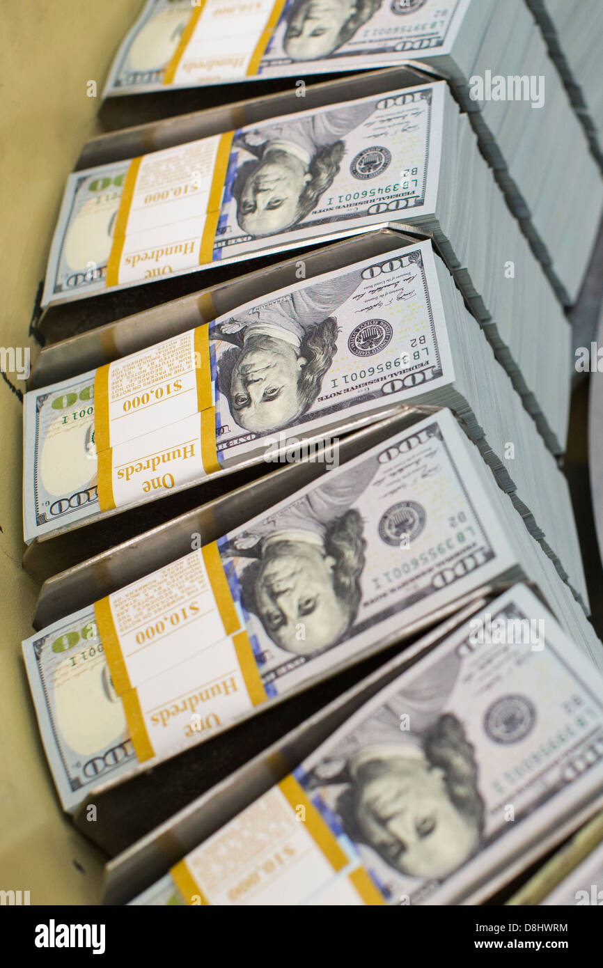 The newly redesigned $100 bill being printed at the Bureau of Engraving and Printing in Washington, DC. Stock Photo