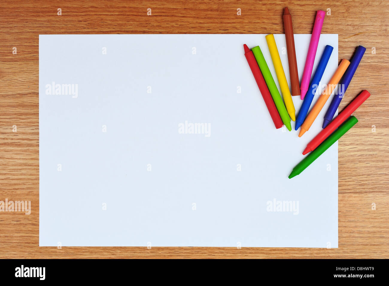 Crayons and white paper Stock Photo