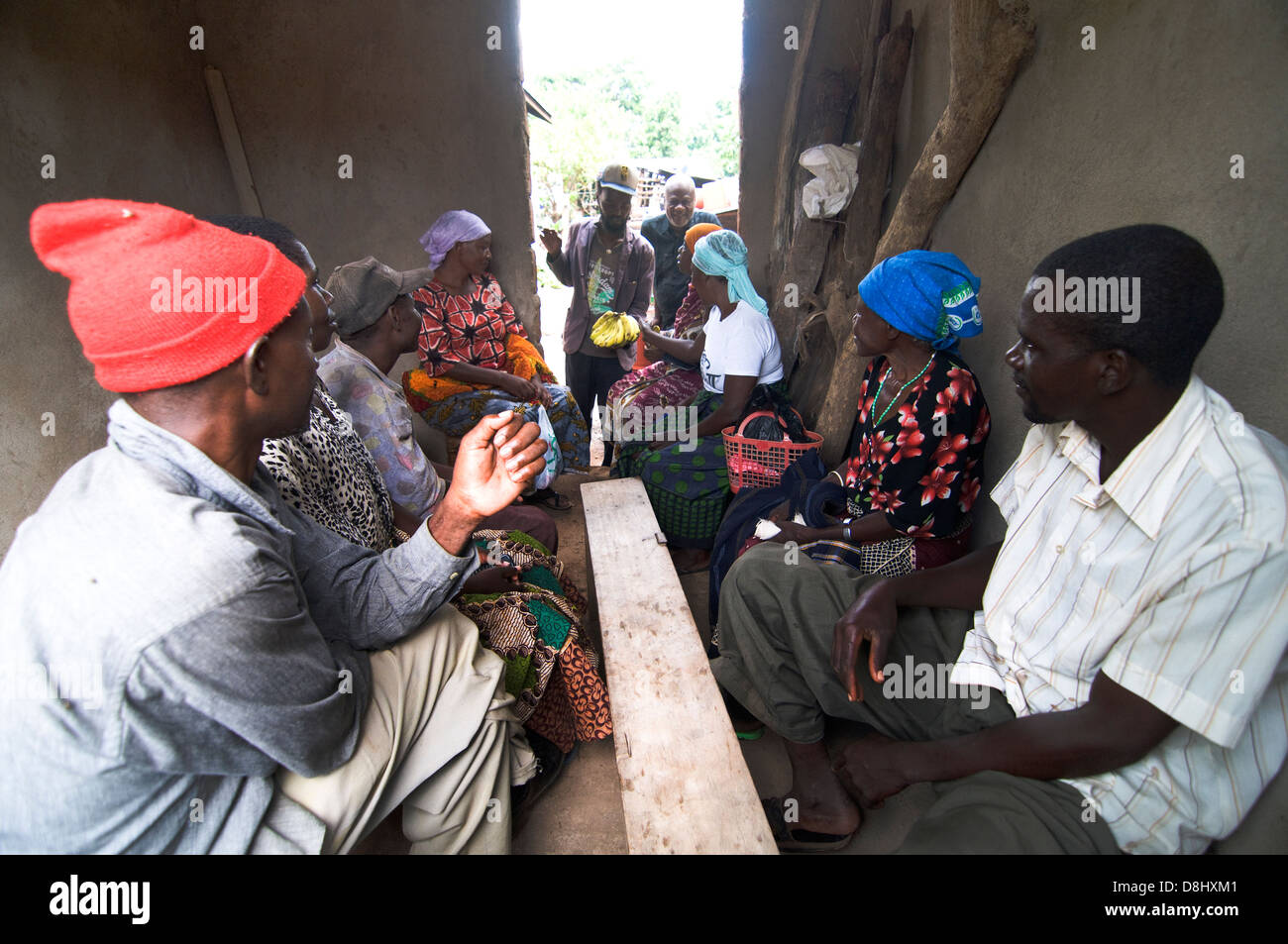 Local patients waiting to see a homeopathic Doctor in a rural clinic in northern Tanzania. Stock Photo