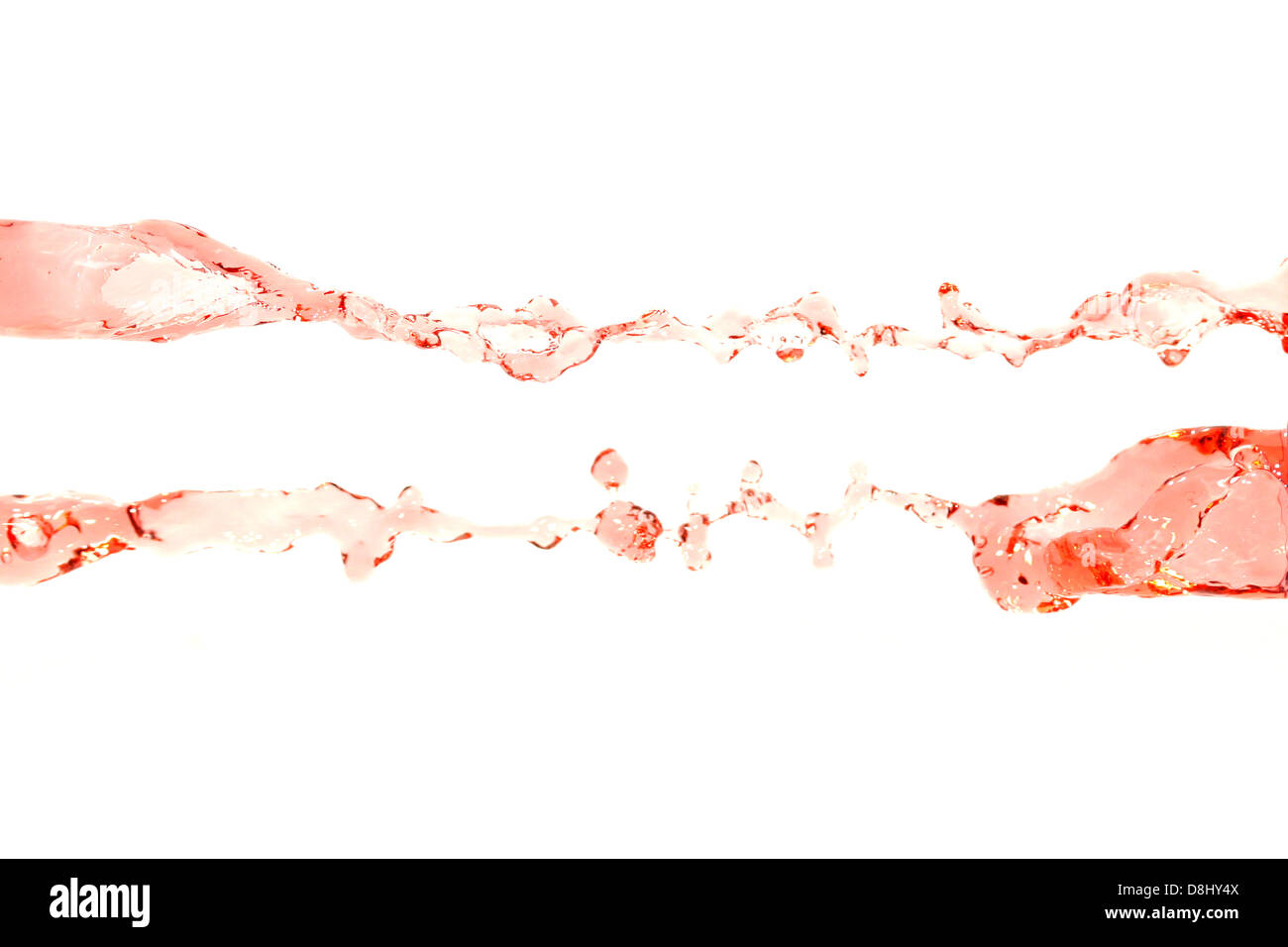 The Red water that spread on The white Background. Stock Photo