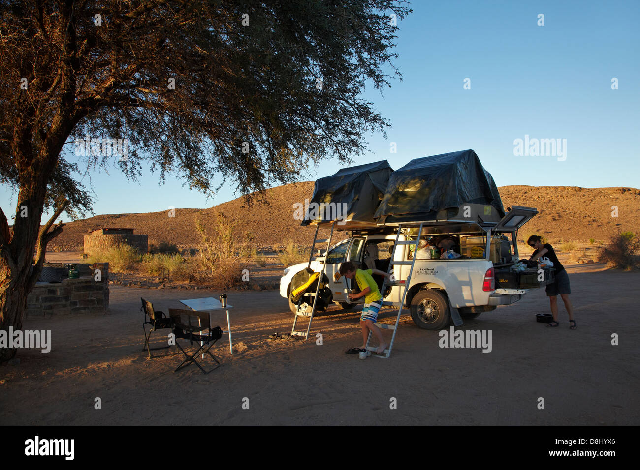 Toyota Hilux camper with roof tents, Canon Roadhouse campsite, near Fish River Canyon, Southern Namibia, Africa Stock Photo