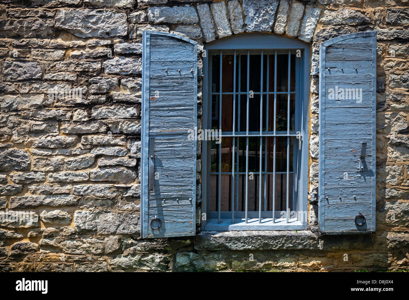 Window in stone wall Stock Photo