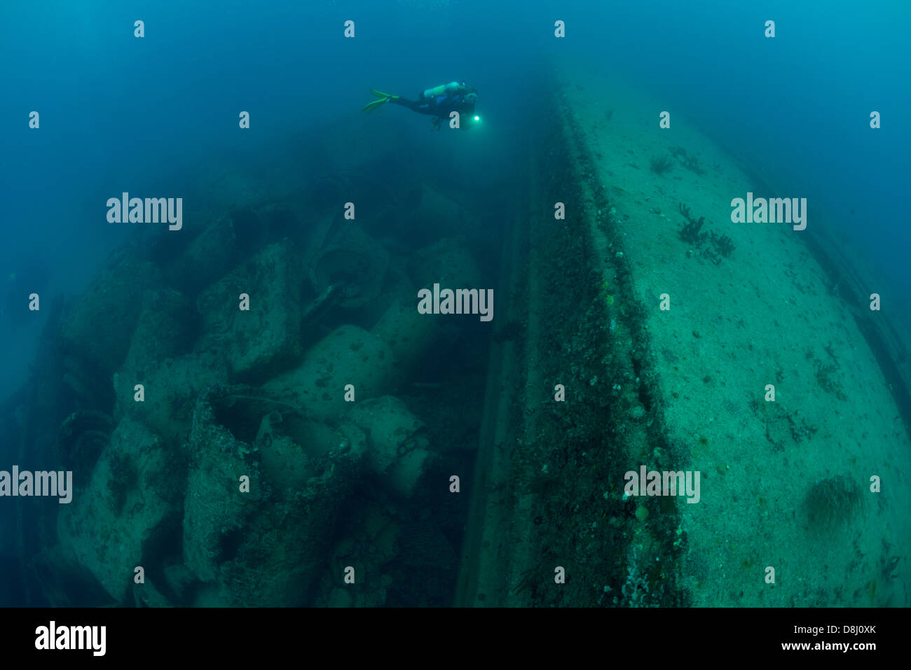 A scuba diver explores a wreck near Fort Lauderdale, Florida Stock Photo