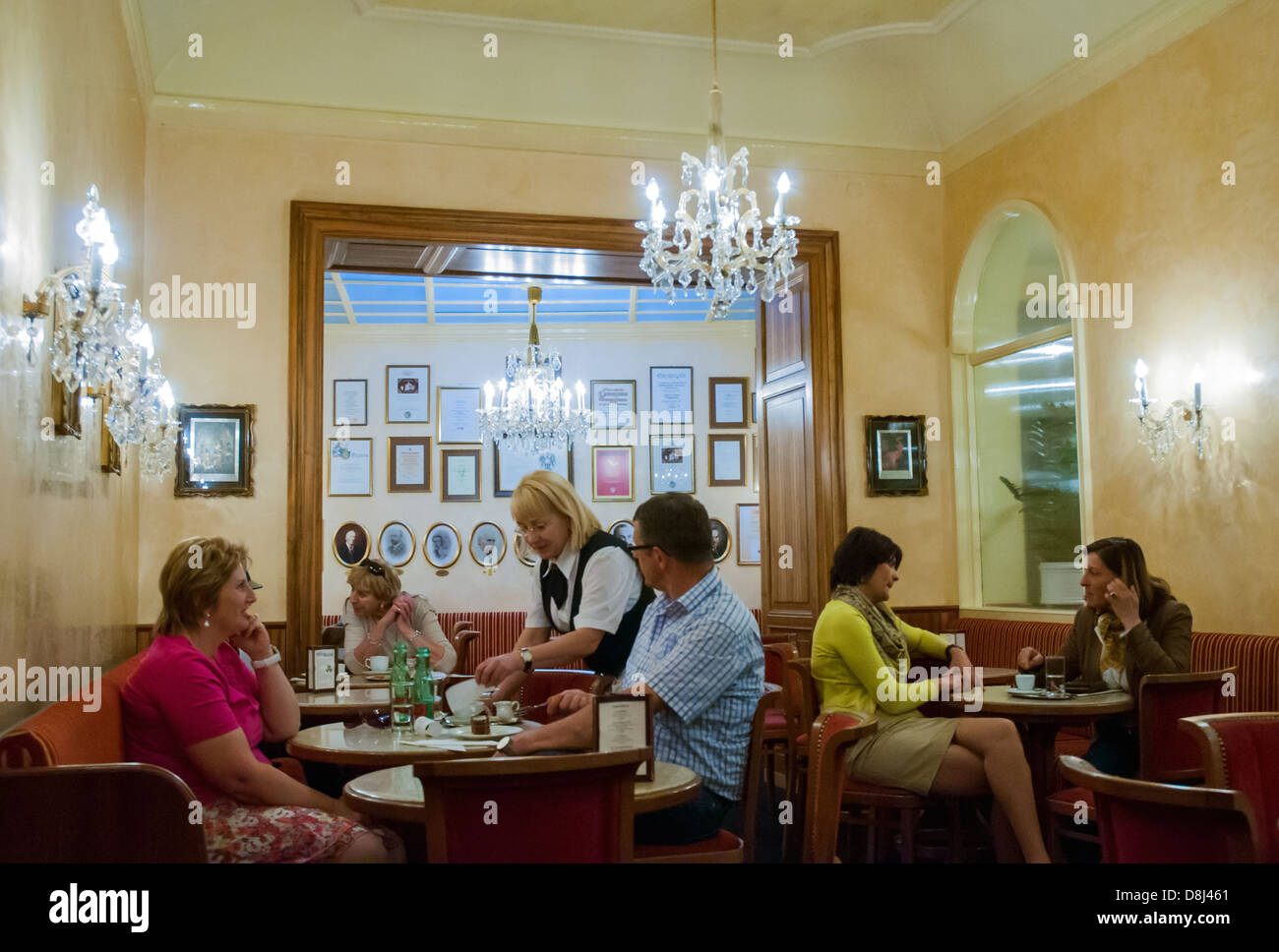 Patrons taking coffee at the Konditorei Zauner, established 1832,  in the Austrian spa town of Bad Ischl. Stock Photo