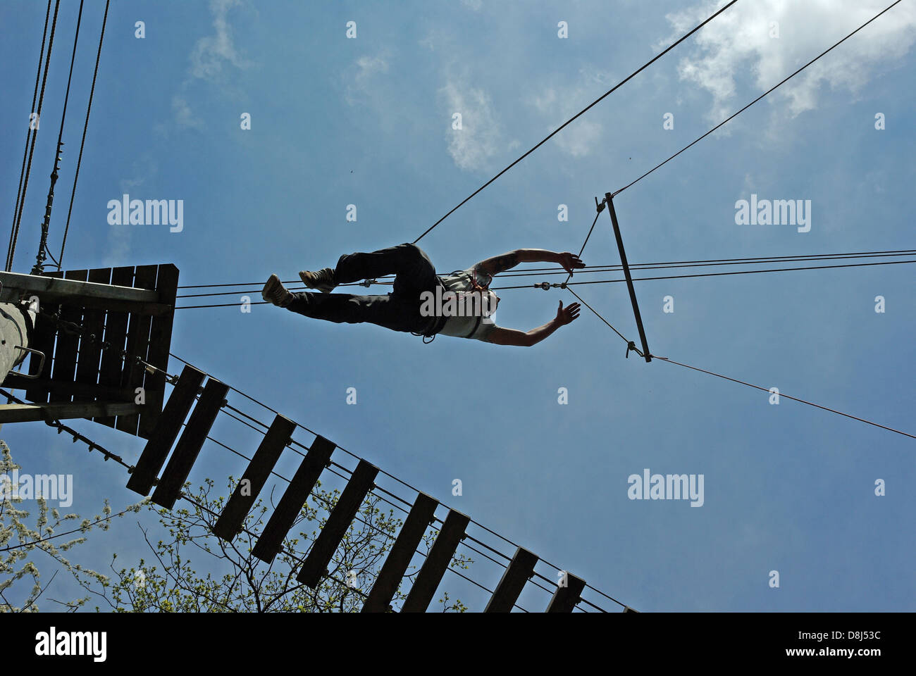 Jump to the trapeze Stock Photo