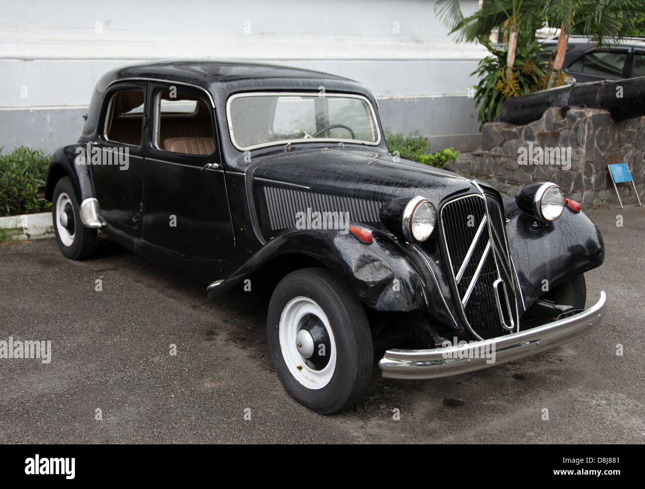 It's a photo of an collection car from France. A Citroen or Peugeot which is parked in a garage or outdoor Stock Photo