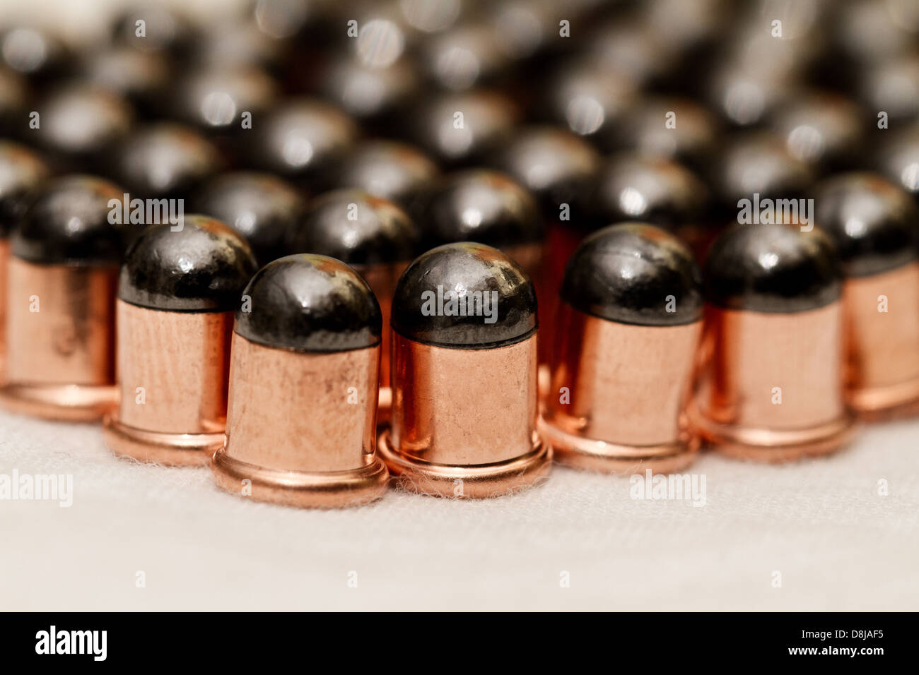 Gun bullets over white background Stock Photo