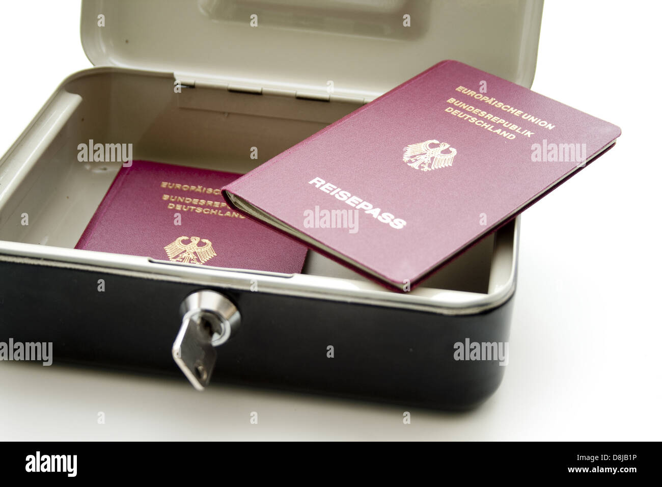 Cashbox with passport Stock Photo