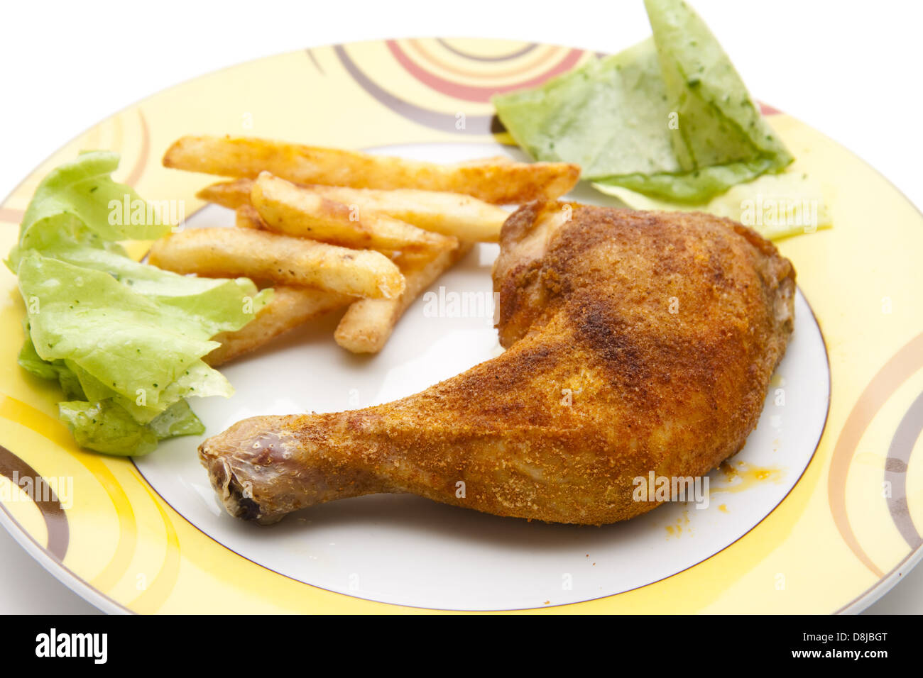 Chickens thigh with fries Stock Photo Alamy