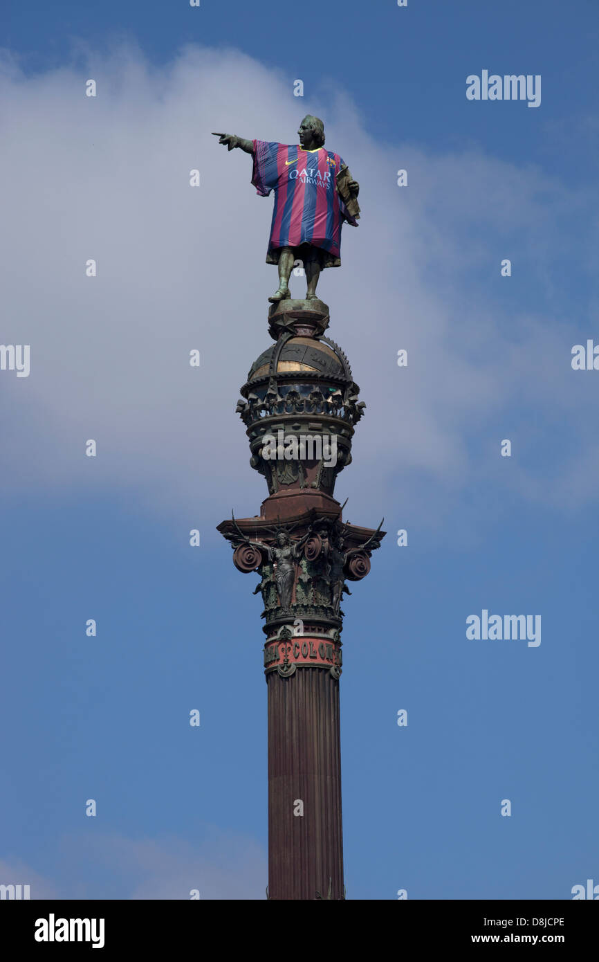 Statue of Christopher Columbus in Barcelona wearing Barcelona football shirt Stock Photo