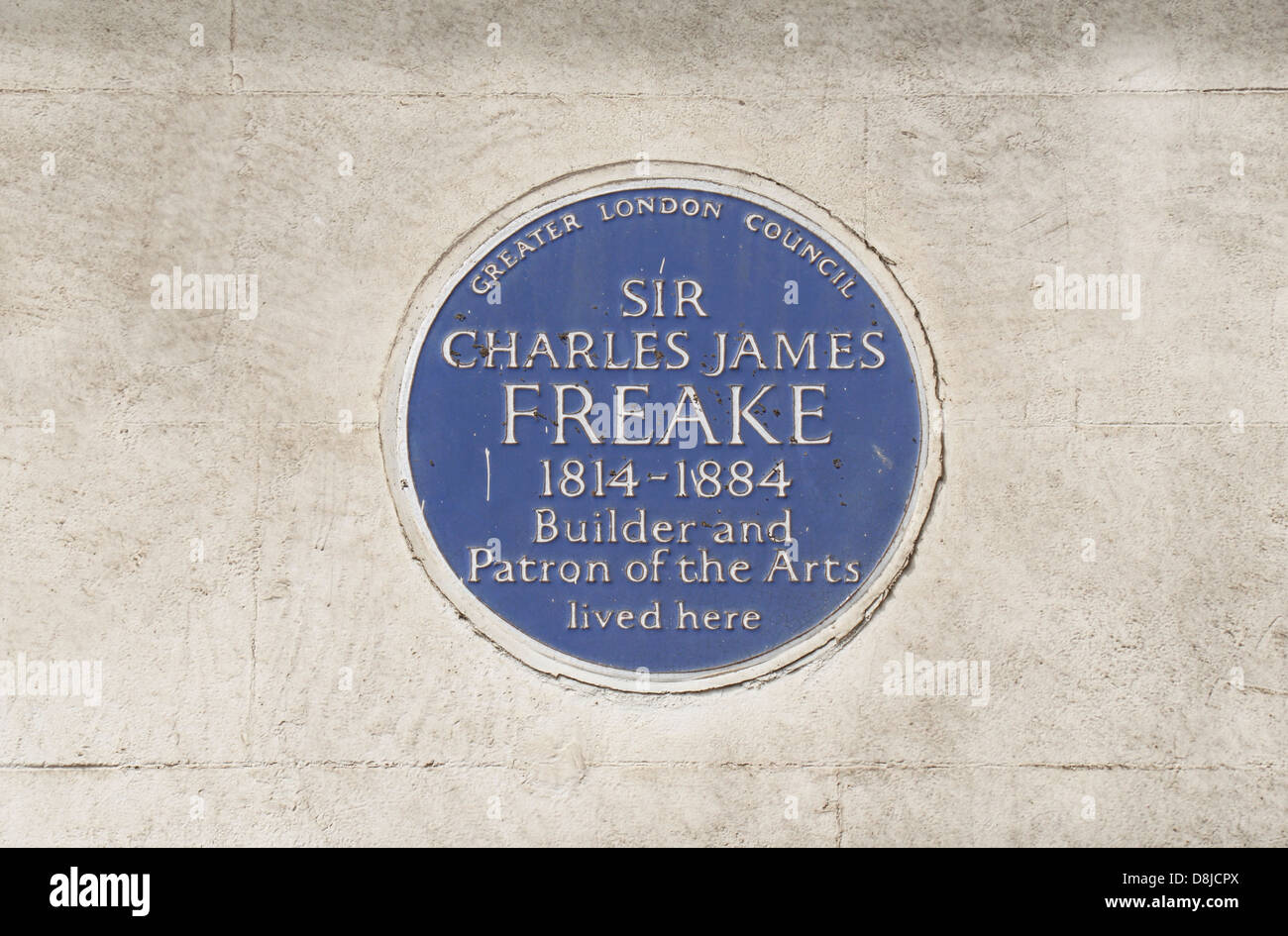 Greater London Council blue plaque for Sir Charles James Freake, builder & patron of the arts, South Kensington, London SW7, UK Stock Photo