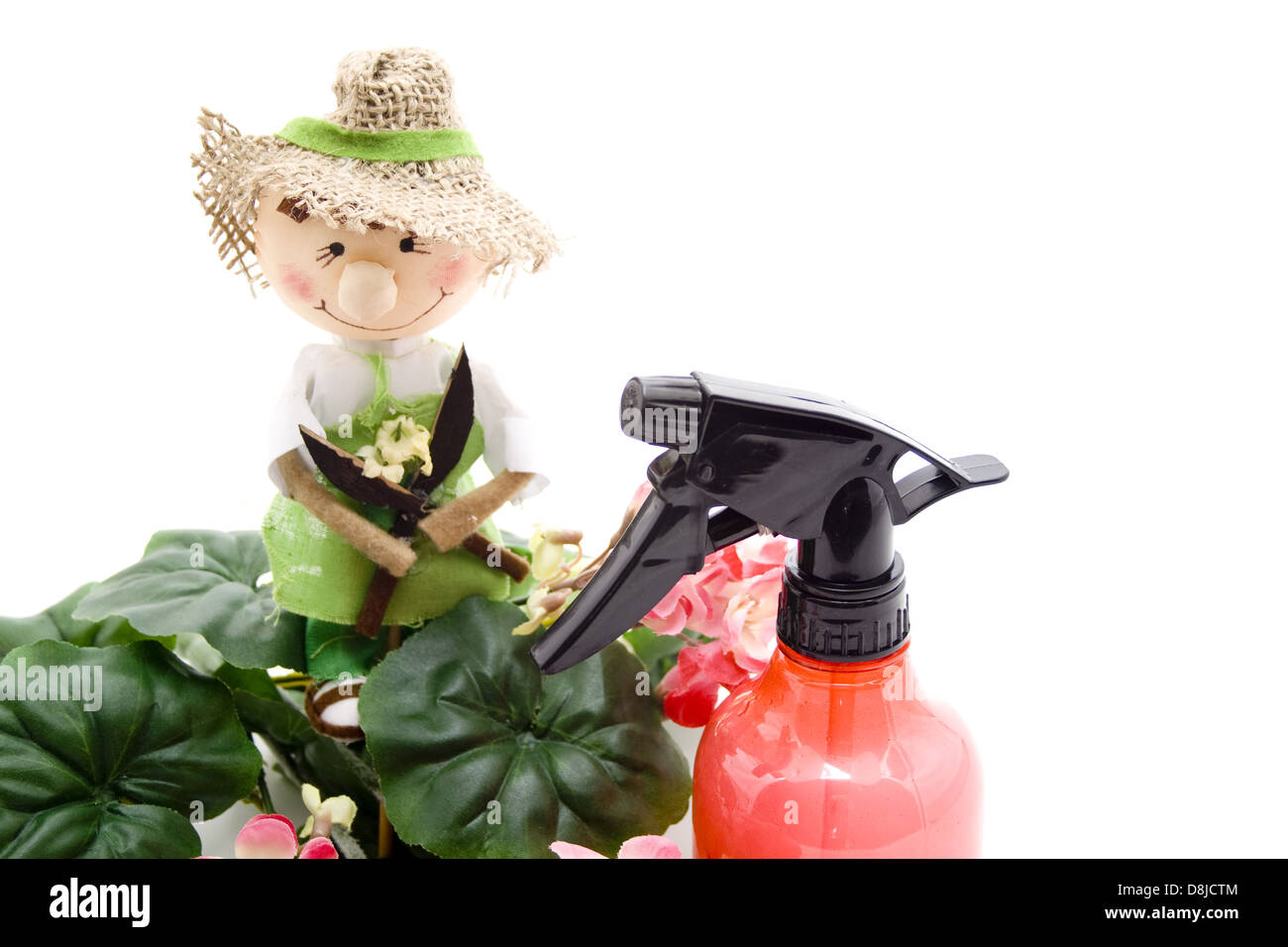 Spray bottle with straw doll Stock Photo