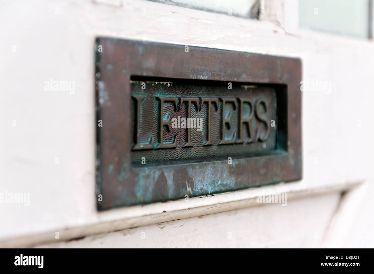 Mail door slot with embossed label Letters Stock Photo Alamy