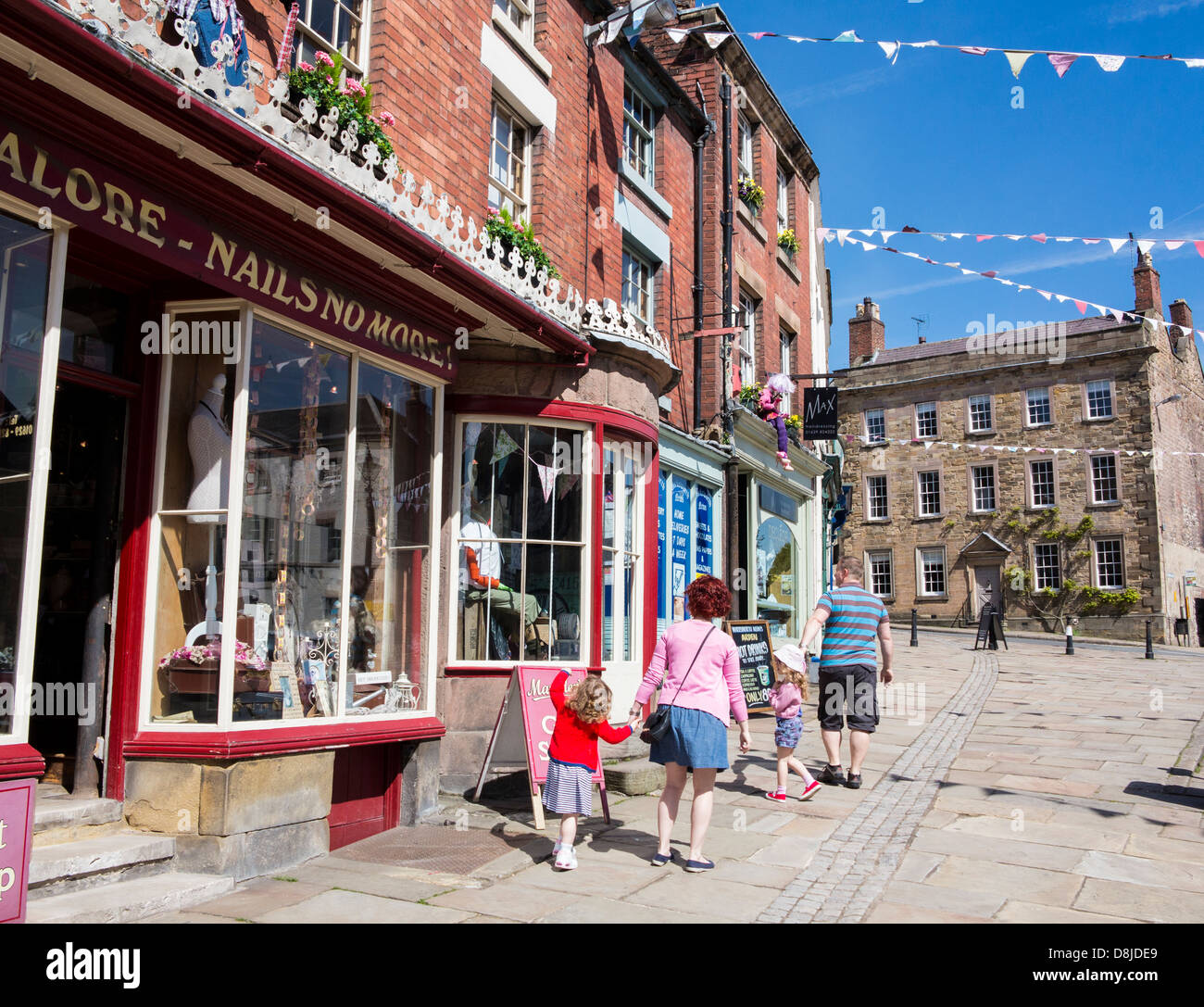 Wirksworth high street with Gifts Galore shop and bunting, Derbyshire, England. Stock Photo