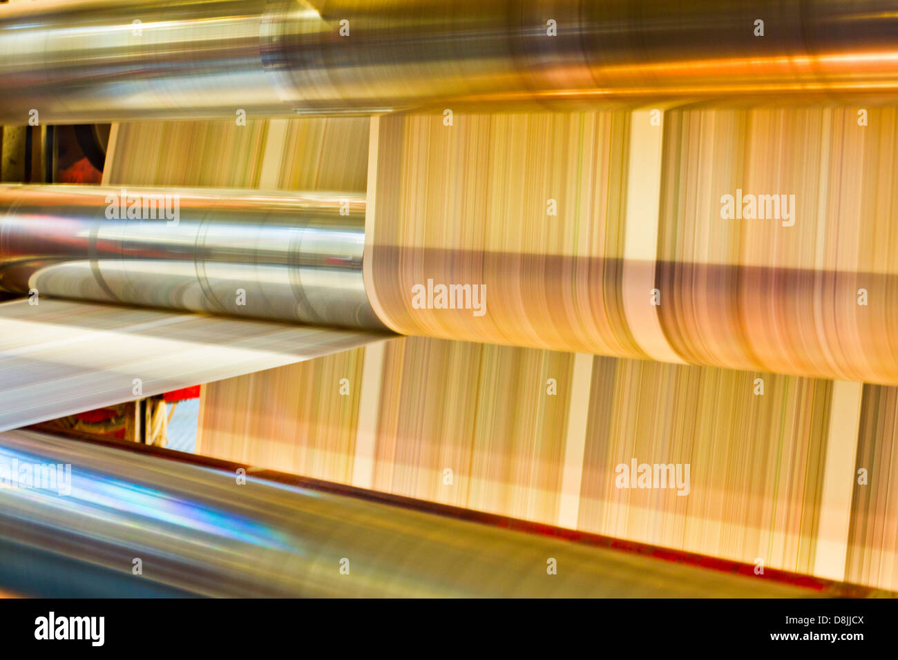 Inside a running newspaper press Stock Photo Alamy