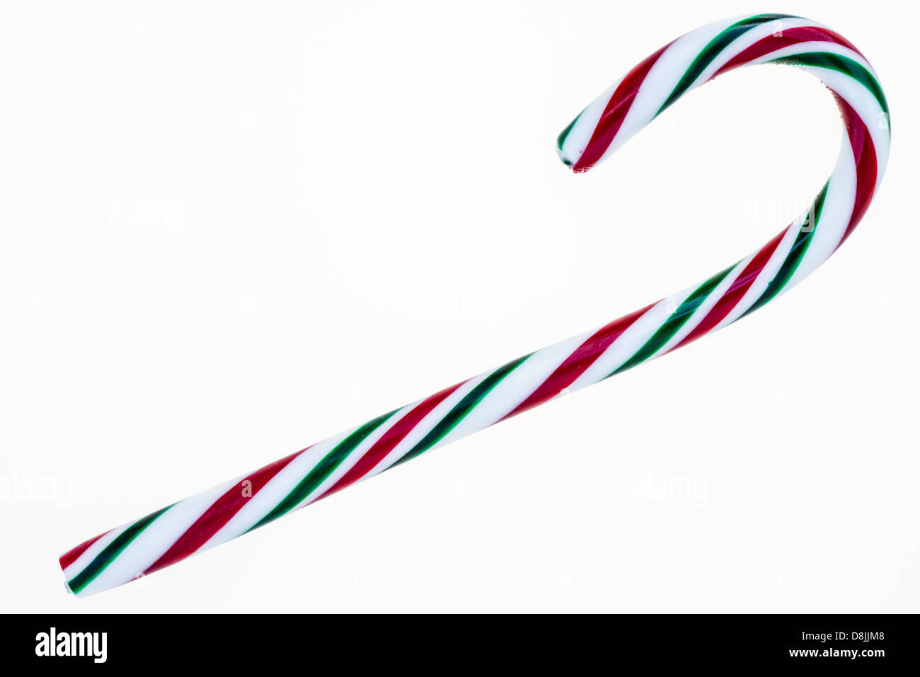 A red, green and white candy cane isolated on a white background Stock