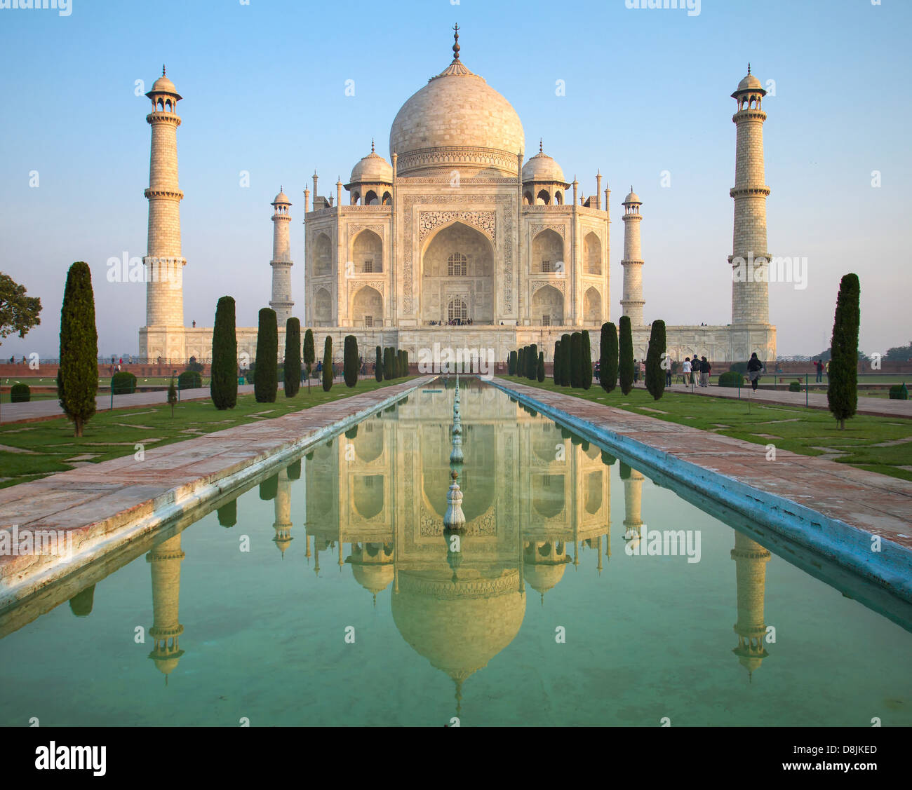 A perspective view on Taj Mahal mausoleum with reflection in water. Agra, India. Stock Photo