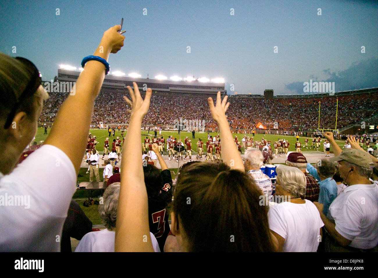 Florida State football fans giving 'Tommy Hawk' cheer. Stock Photo