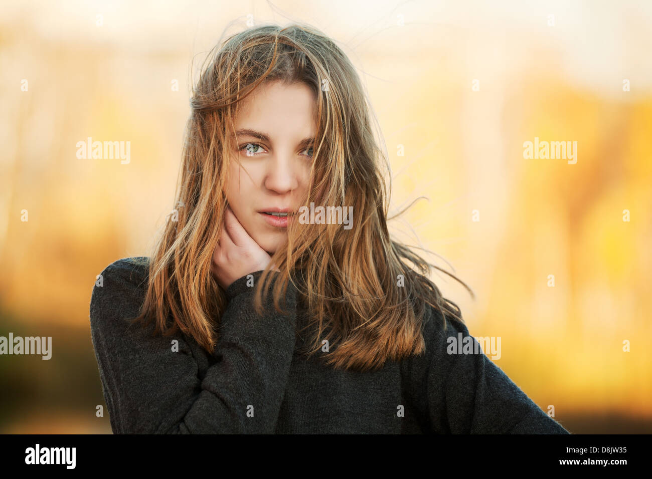 Young girl in an autumn park Stock Photo - Alamy