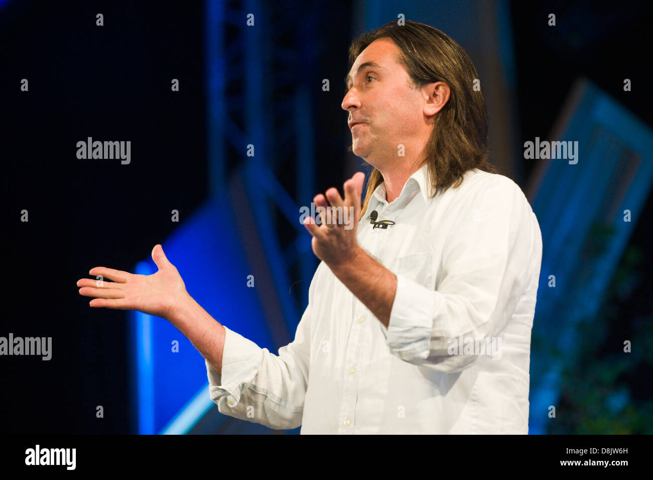 Neil Oliver giving a talk about the Vikings on stage at ...