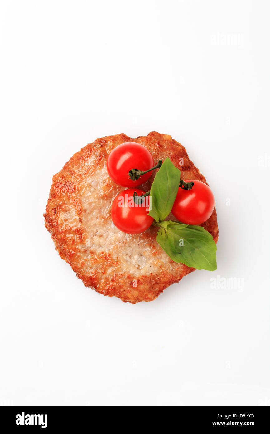 Pan fried chicken patty studio shot Stock Photo Alamy