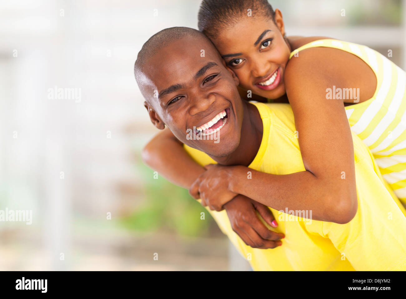 Love makes everything possible. Handsome young man giving his girlfriend a  piggyback ride while spending time together 13571900 Stock Photo at Vecteezy