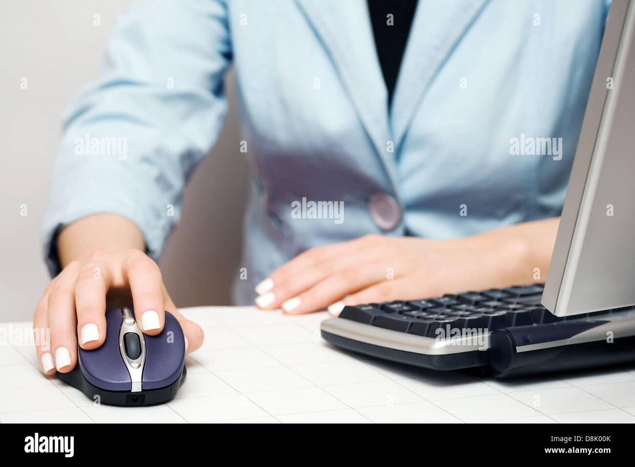 Female hand holding computer mouse Stock Photo - Alamy