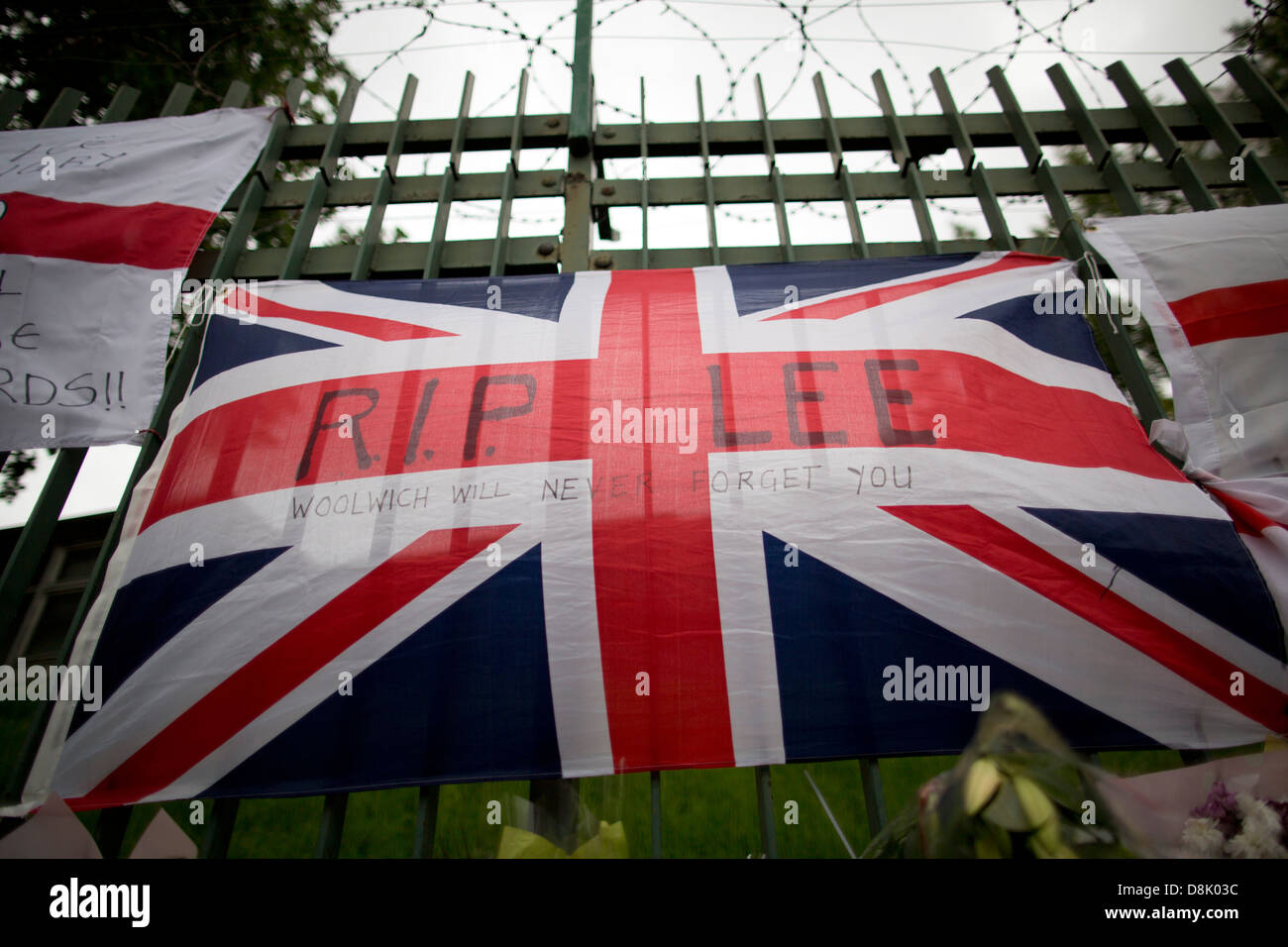 Flower are left at the scene where Drummer Lee Rigby was killed outside Woolwich Barracks in London. Stock Photo