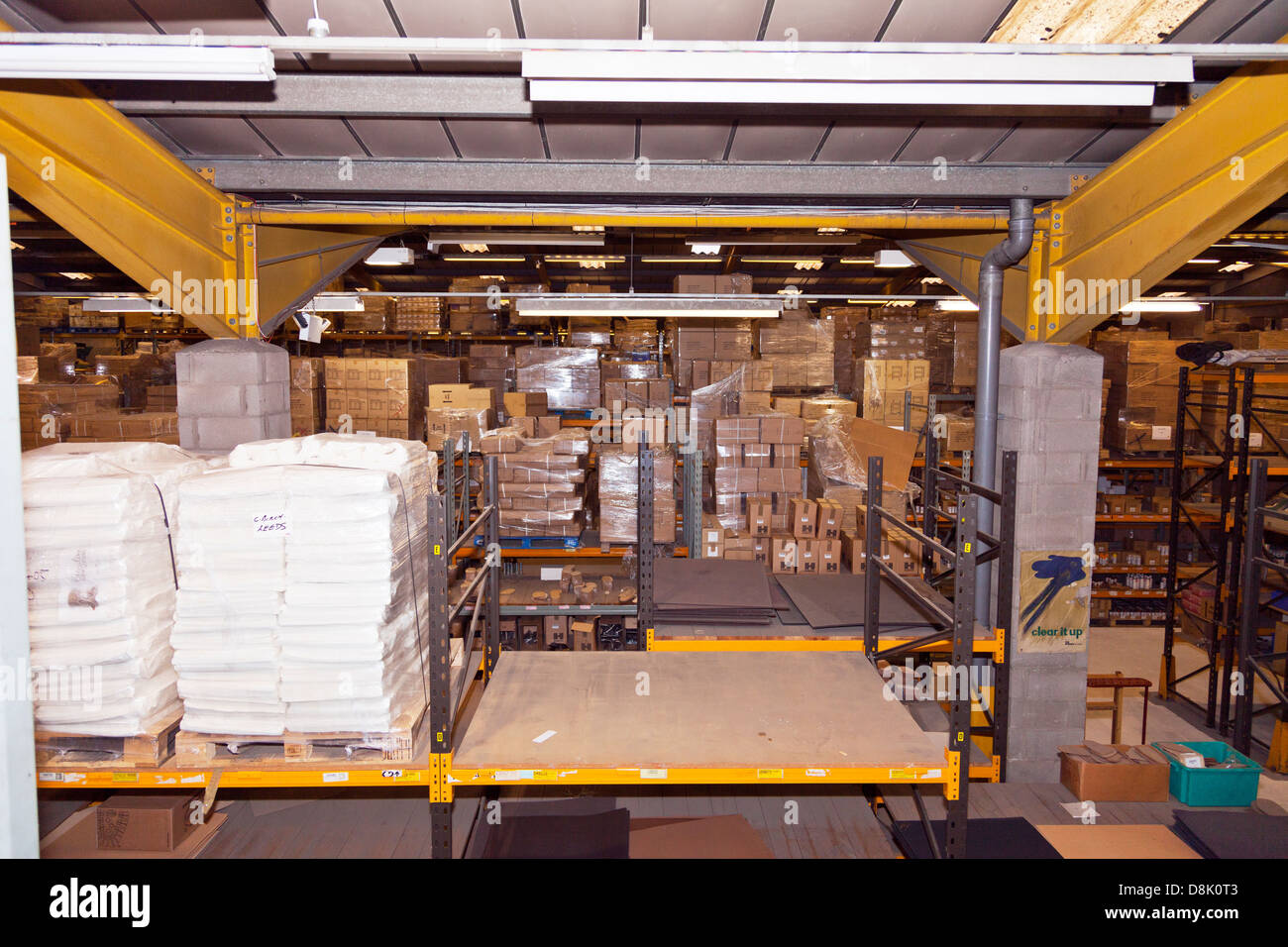 overview of cardboard boxes piled high at Charles Birch Ltd Warehouse shoe repair supplies, Leeds Stock Photo