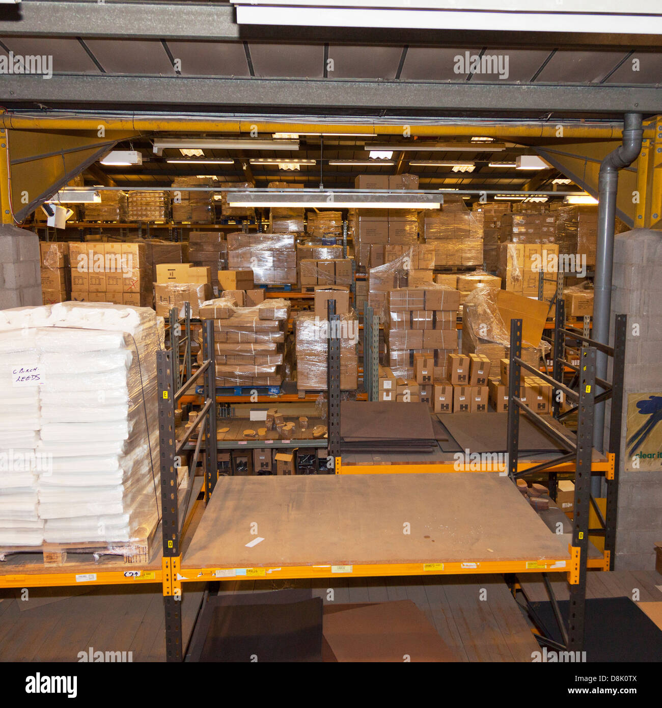 overview of cardboard boxes piled high at Charles Birch Ltd Warehouse