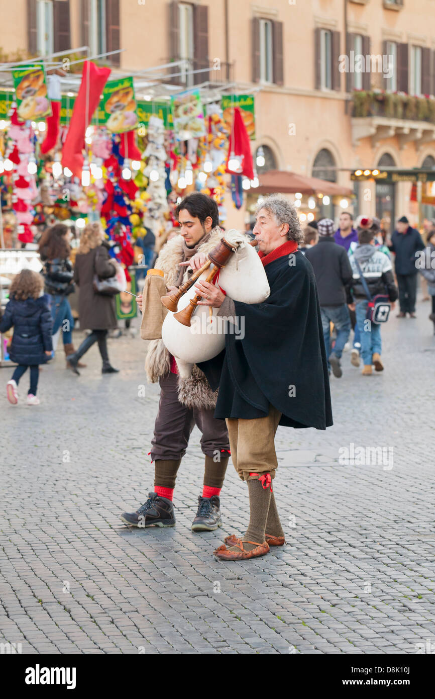 Zampognari in Navona square at Christmas time, Rome, Italy Stock Photo