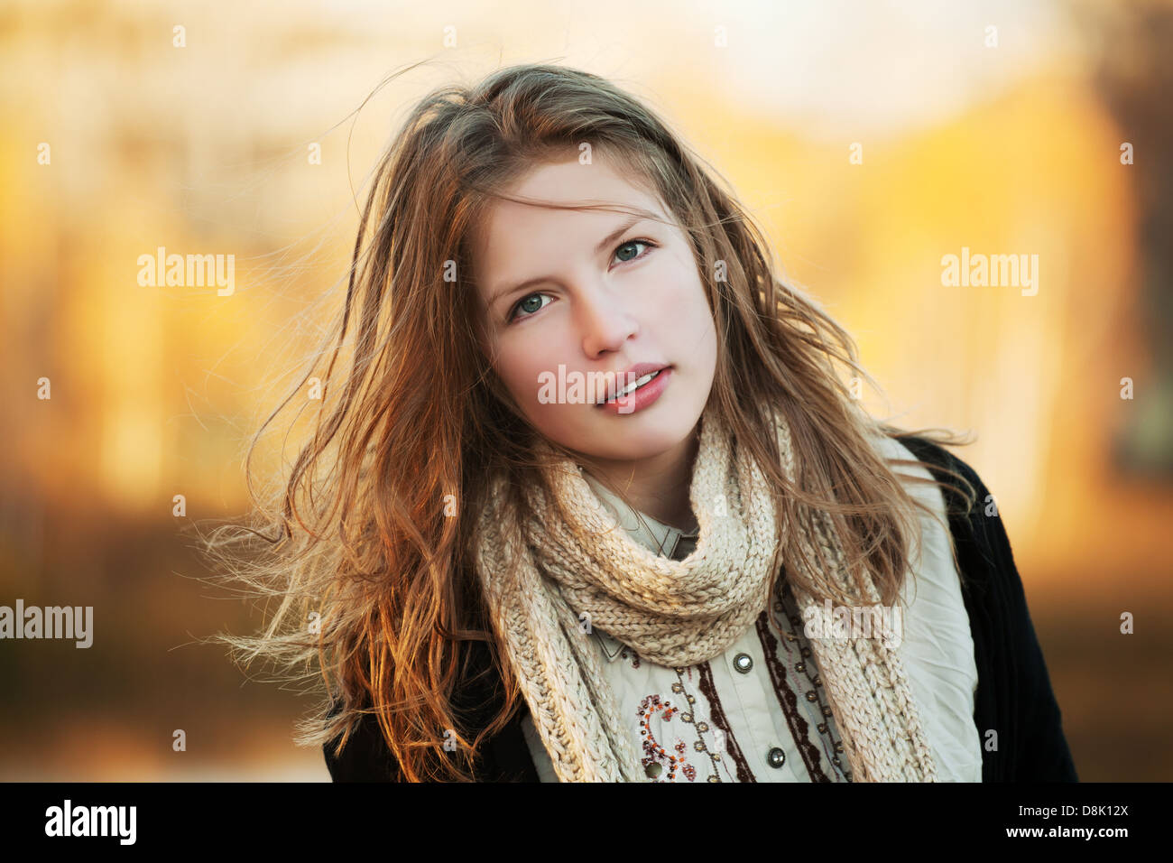 Young girl in an autumn park Stock Photo - Alamy