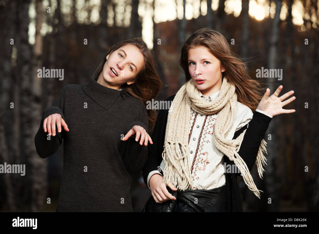 Young girls in an autumn park Stock Photo - Alamy