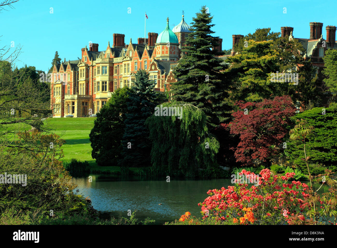 Sandringham House and Lake, Norfolk, country retreat of HM the Queen, 19th century British Victorian architecture, England UK Stock Photo
