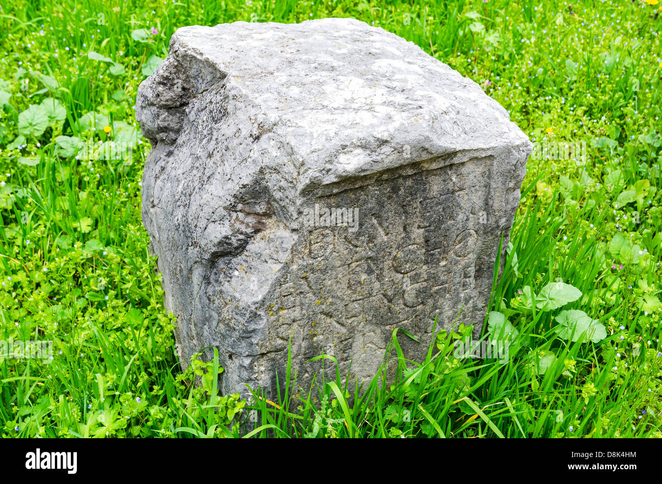 Ancient ruins of a burial graved stone in Verona, Italy Stock Photo