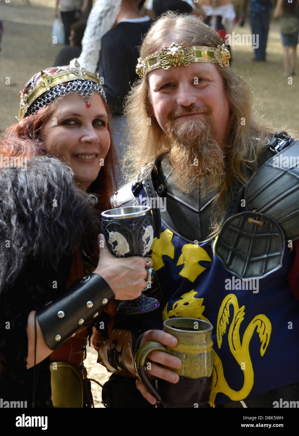 Couple dressed in medieval outfits during the Renaissance festival in ...