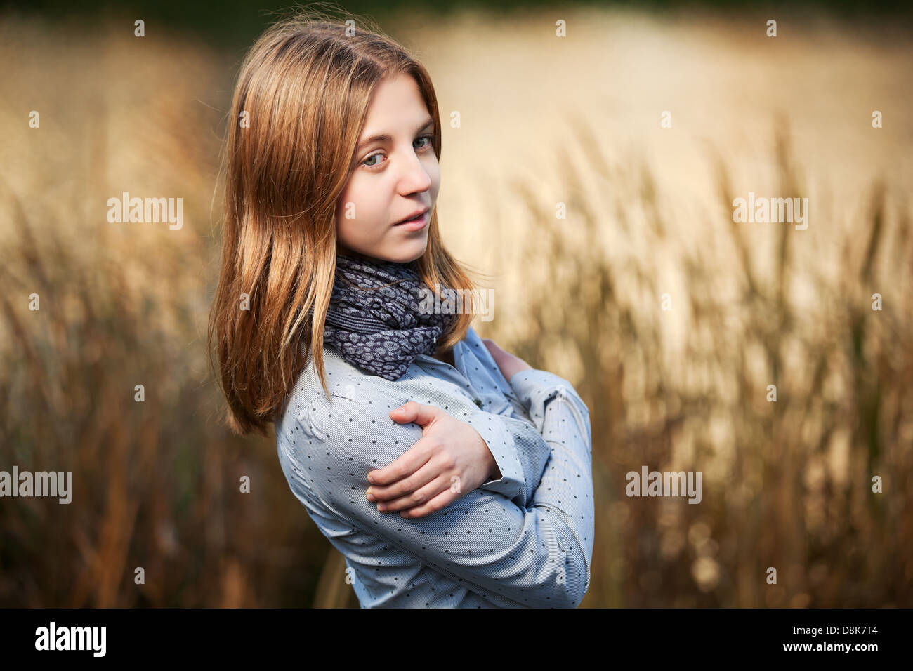 Young girl in an autumn park Stock Photo - Alamy
