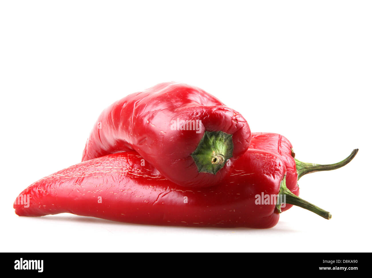 Red chilli peppers on white background Stock Photo - Alamy