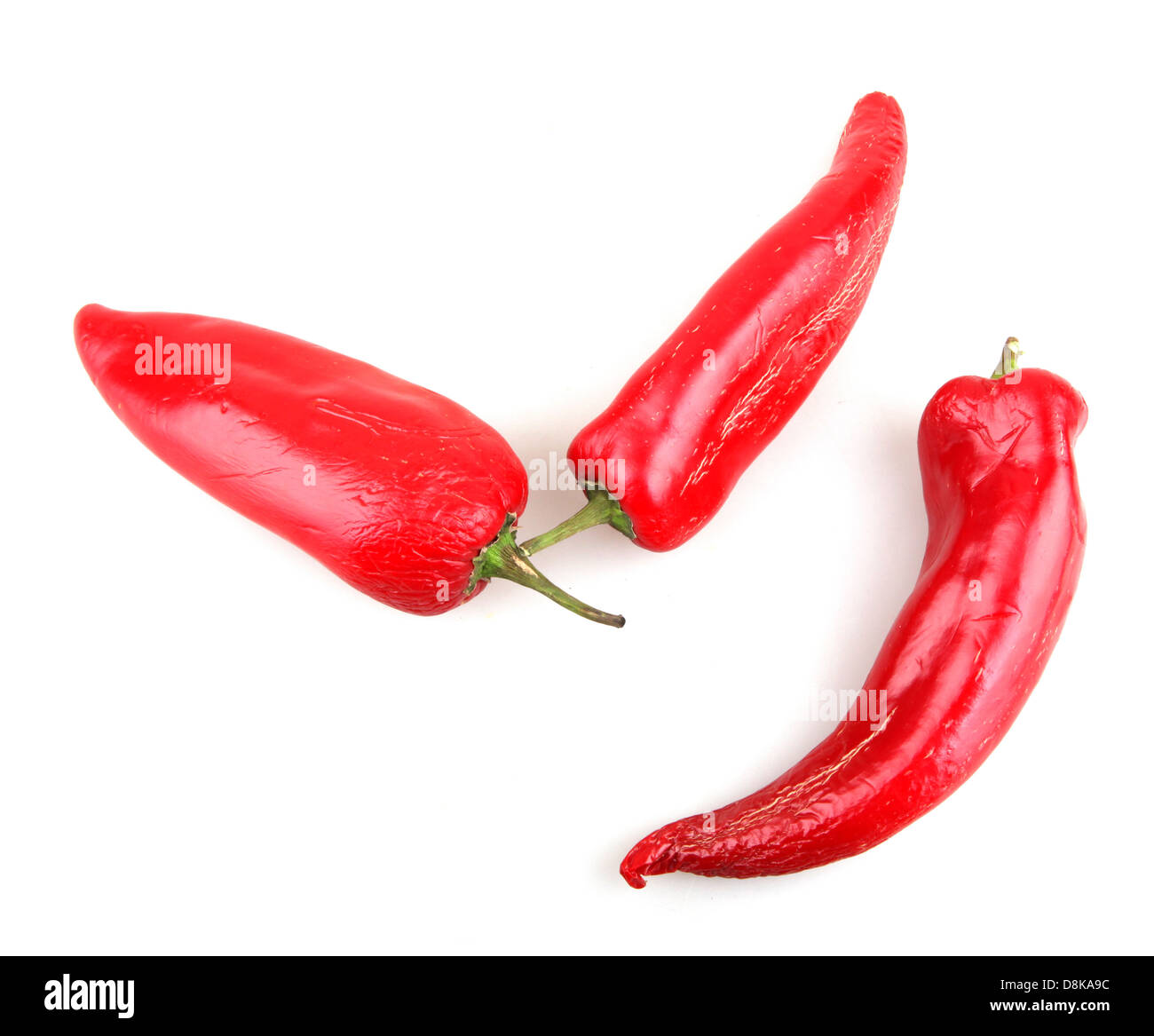 Red chilli peppers on white background Stock Photo - Alamy