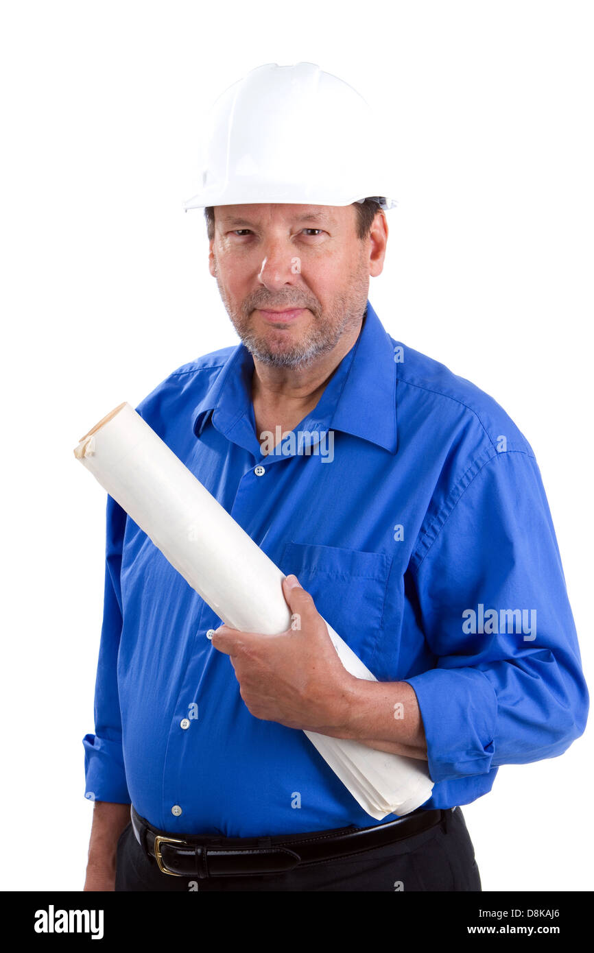 Happy and smiling elderly contractor holds blueprints and wears a hardhat as he works into his retirement years. Stock Photo