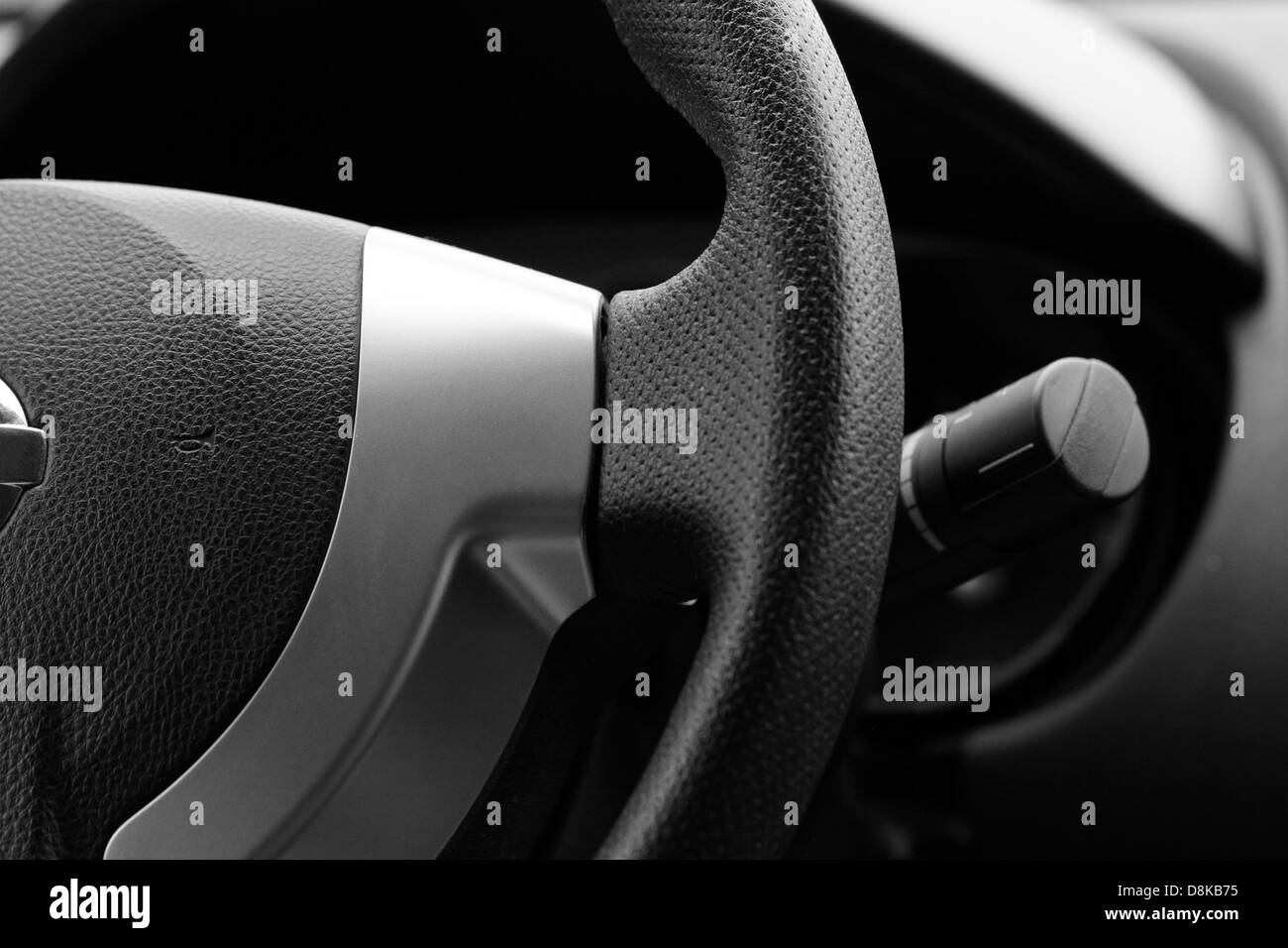 Steering wheel in interior of a new car Stock Photo