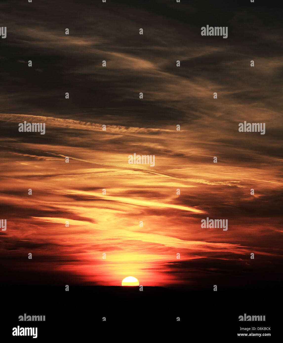red sunset sky stormy clouds Stock Photo - Alamy