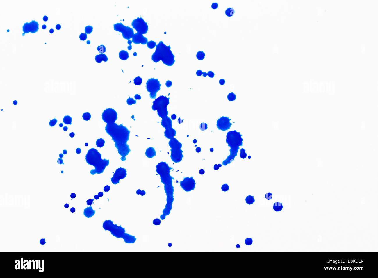 Blue splatter on white background Stock Photo - Alamy