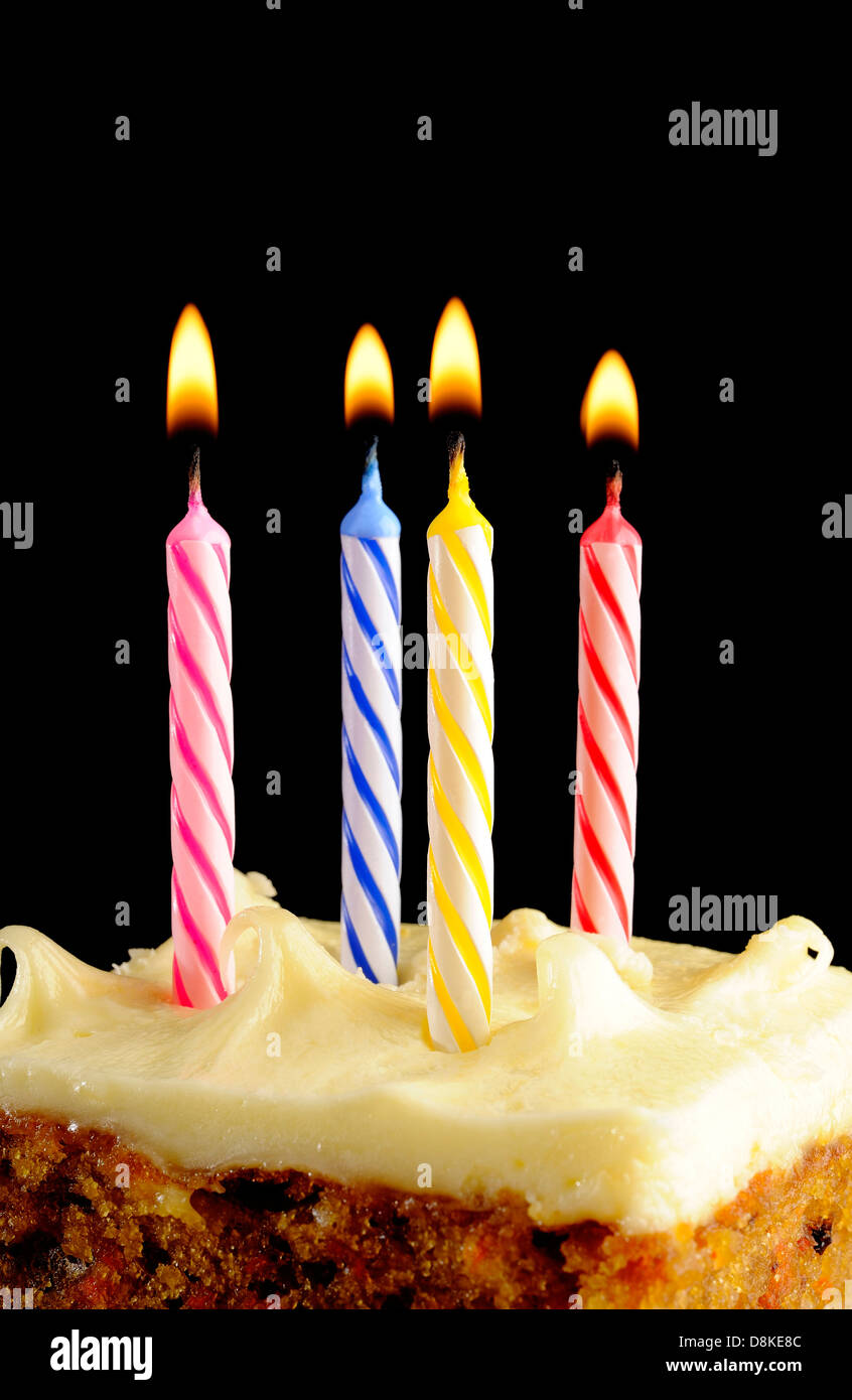 Birthday candles on black background Stock Photo - Alamy